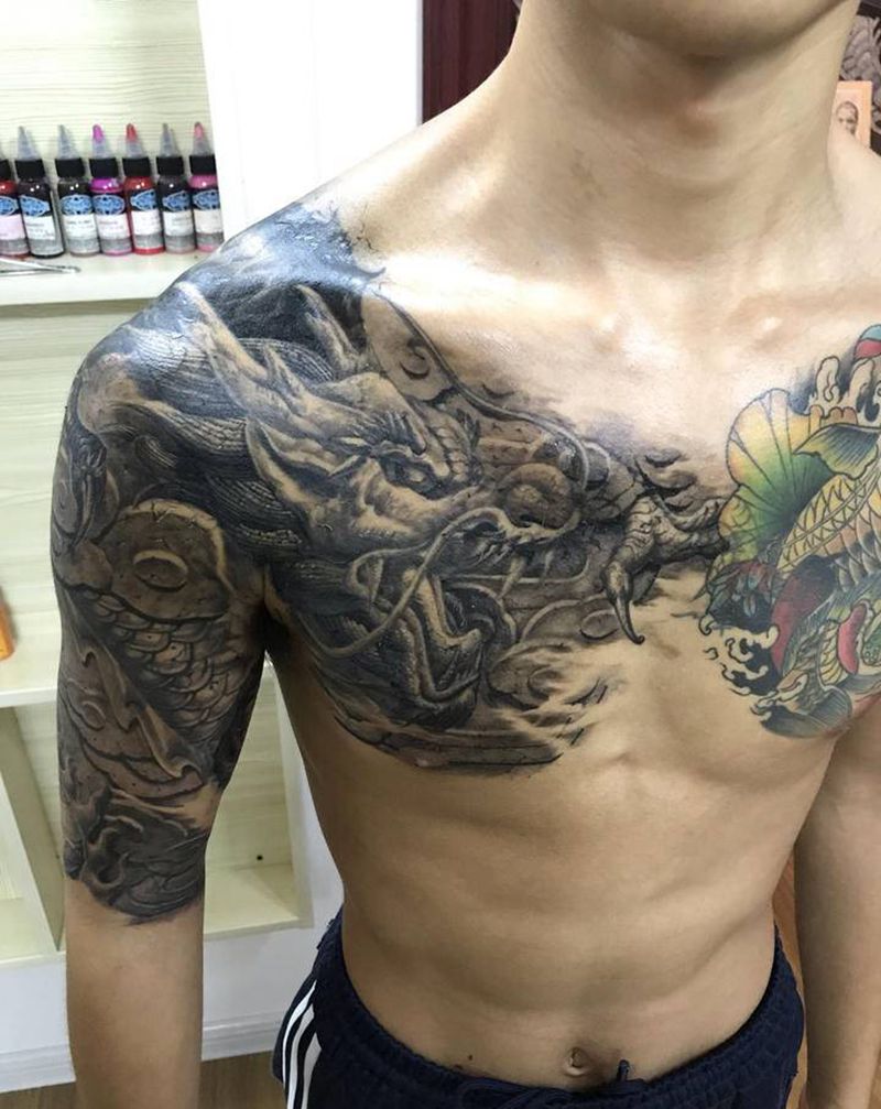 雕龙臂纹身图片_胸部手臂纹身图案