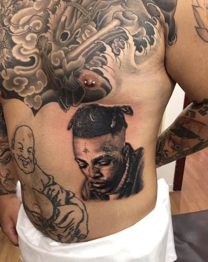 纪念-XXXTent纹身图片_腰部腹部纹身图案