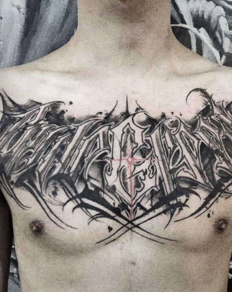 花体字纹身图片_胸部图腾纹身图案