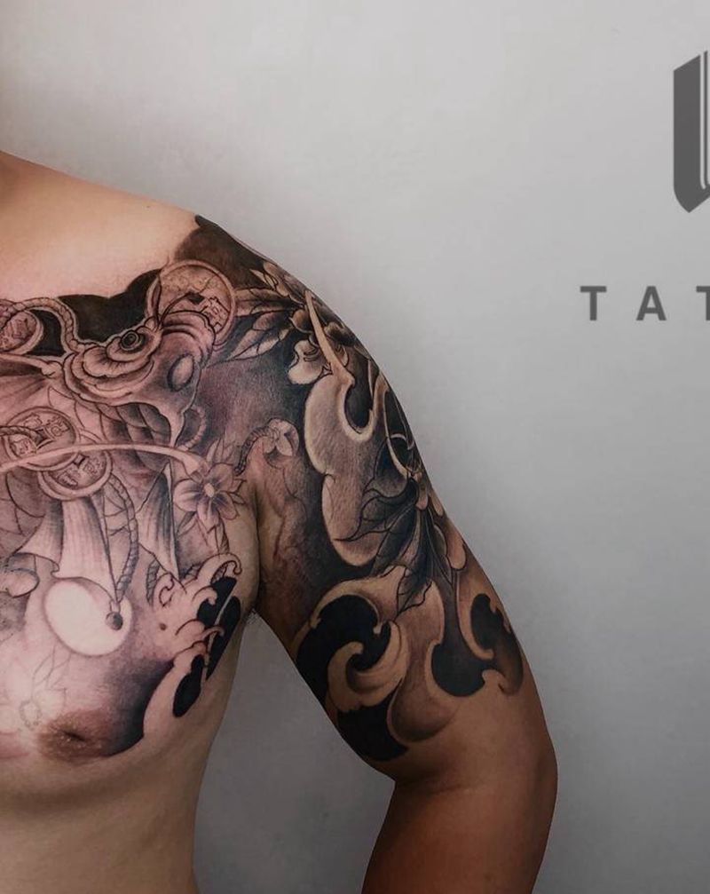 锦鲤半钾纹身图片_胸部手臂新传统纹身图案