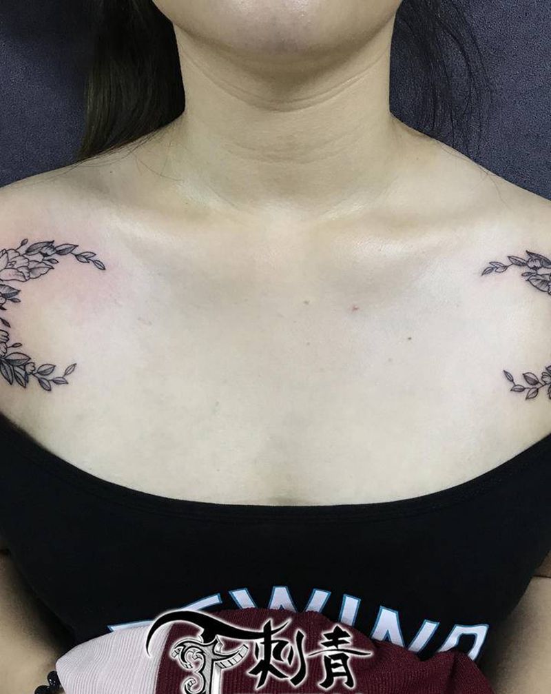 素花纹身图片_胸部点刺几何素花纹身图案