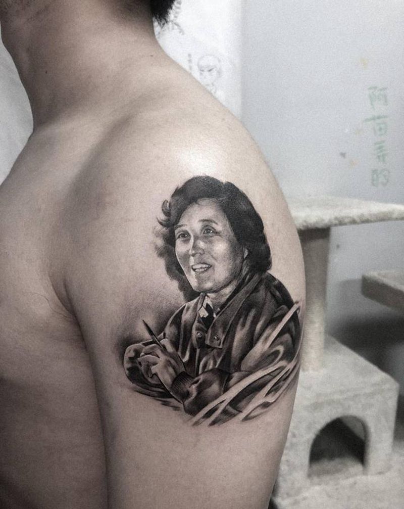 老照片纹身图片_手臂欧美写实纹身图案