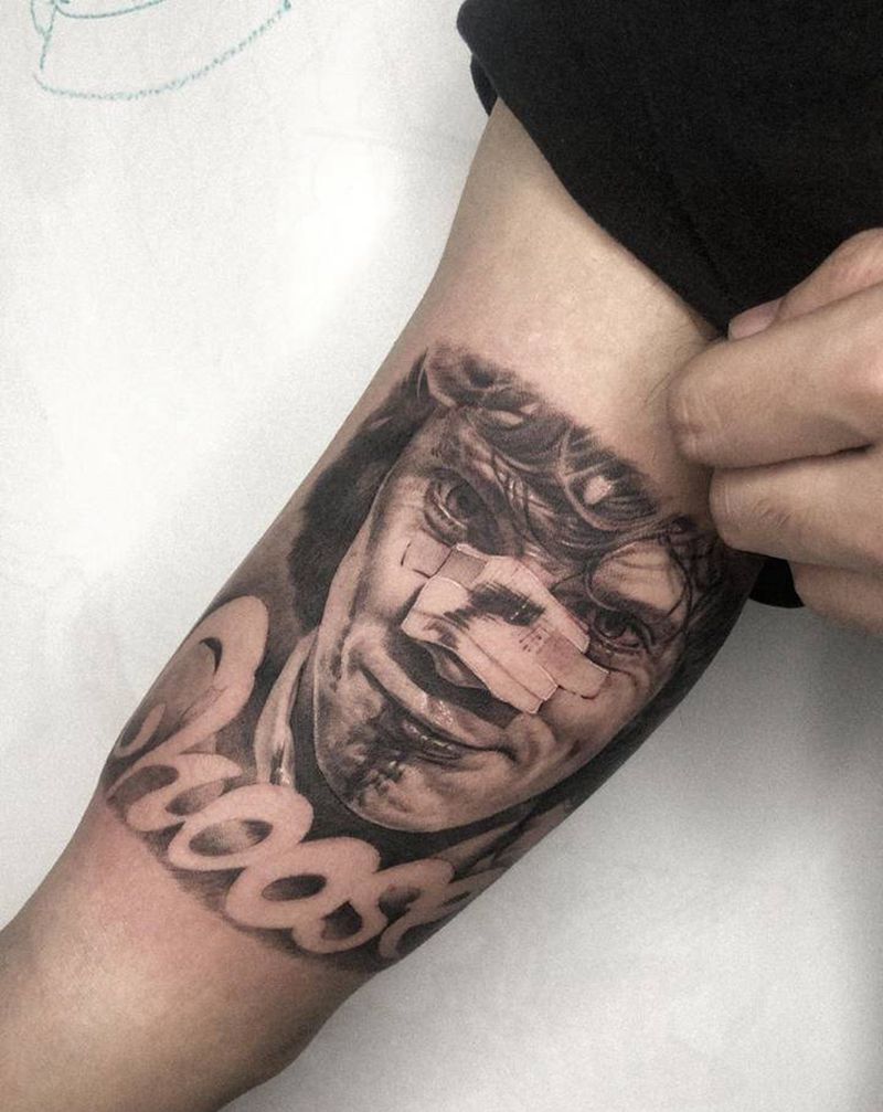 Alex纹身图片_手臂欧美写实纹身图案