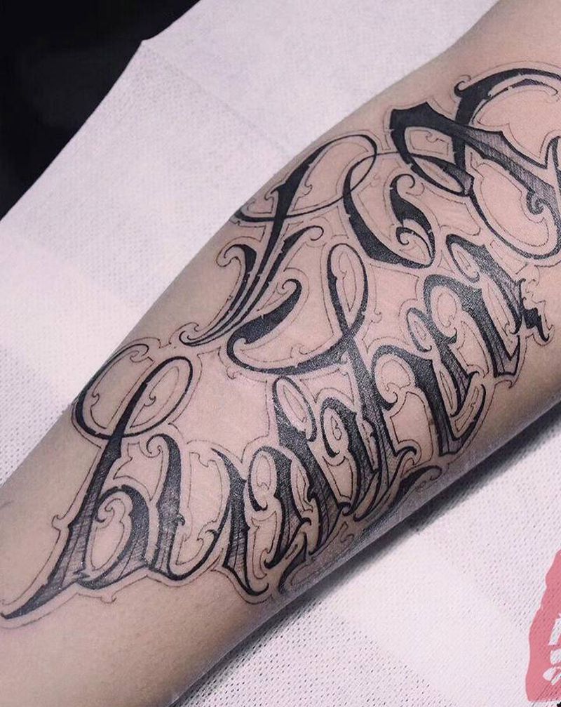 奇卡诺纹身图片_手臂花体字长沙纹身图案
