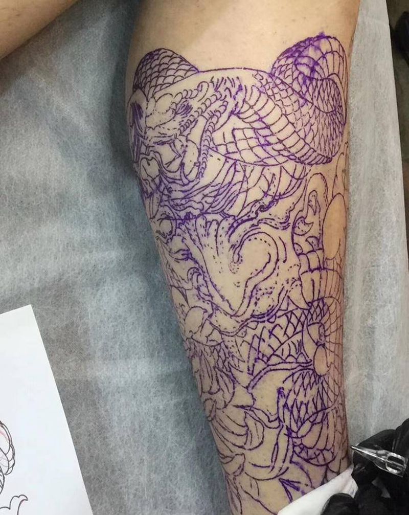 般若蛇未完纹身图片_腿部新传统纹身图案