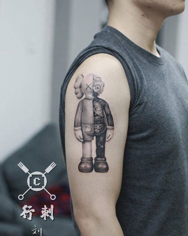 kaws纹身图片_手臂欧美写实纹身图案