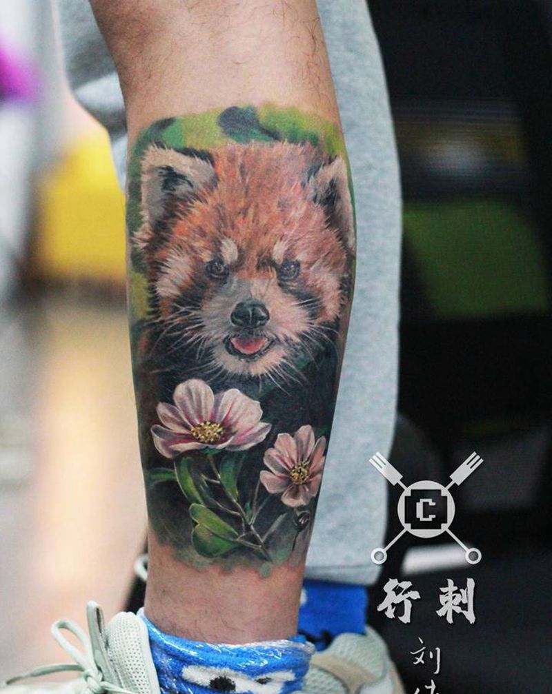 小浣熊纹身图片_腿部欧美写实纹身图案