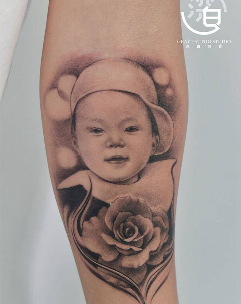 宝宝肖像纹身图片_手部手臂欧美写实肖像纹身图案