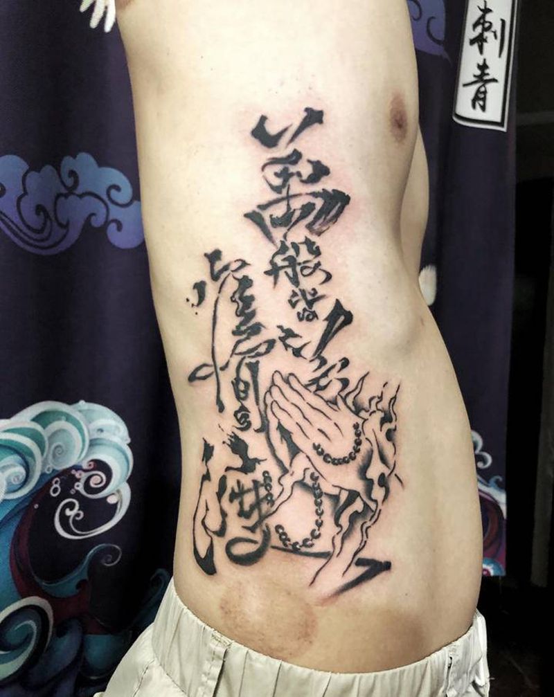 万般皆苦 唯有自渡纹身图片_腰部水墨纹身图案