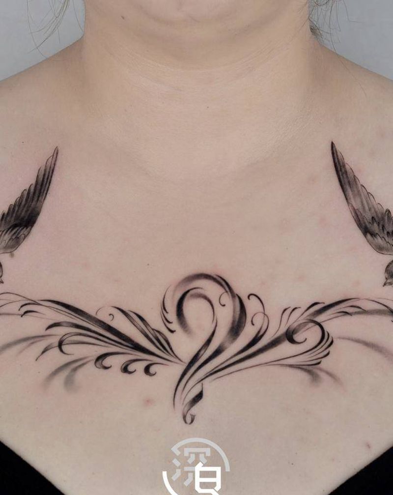 雙燕纹身图片_肩部欧美写实燕纹身图案