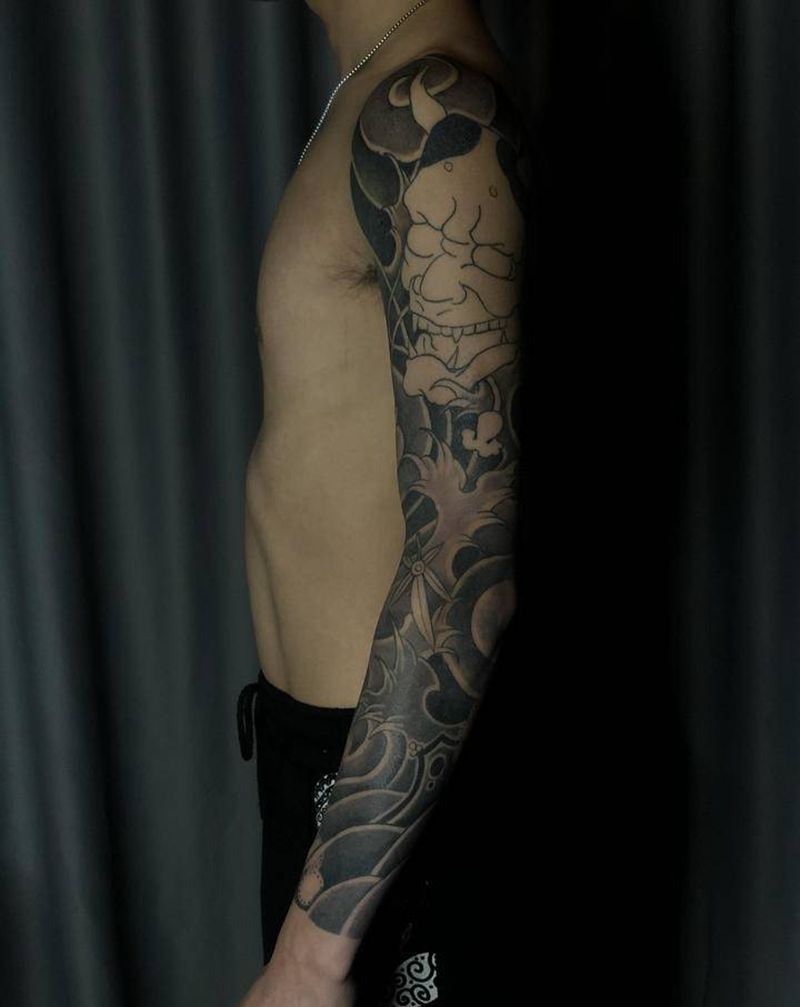 日式黑灰未完纹身图片_手臂老传统纹身图案