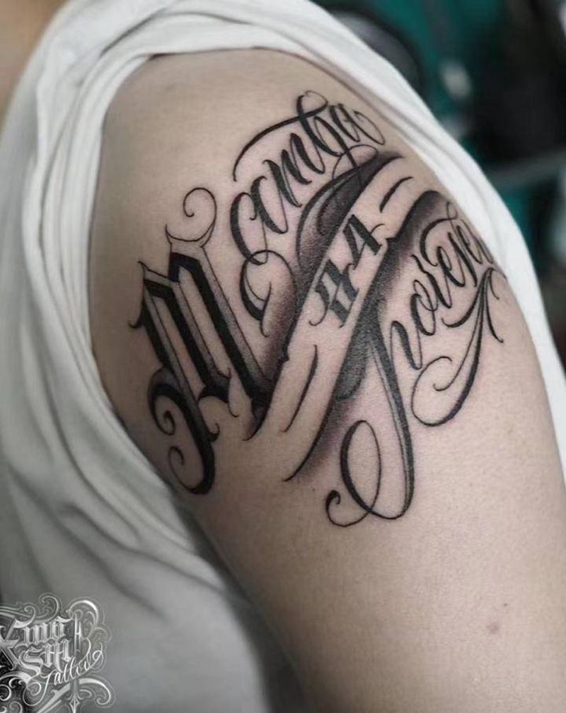 曼巴精神纹身图片_手臂纹身图案