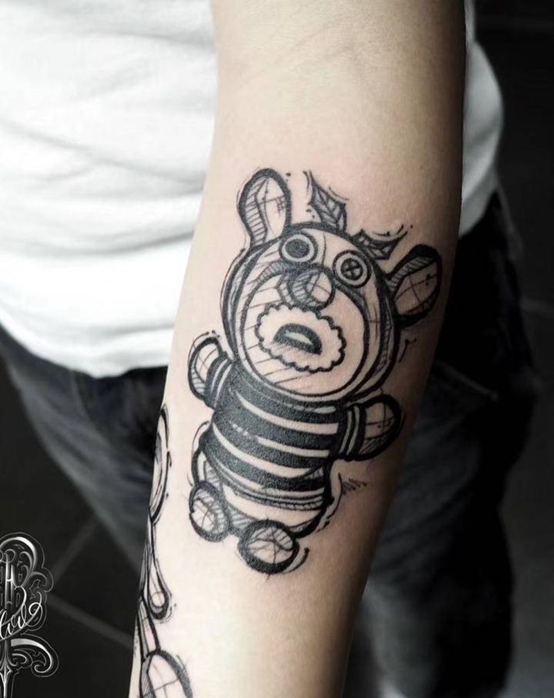 玩偶纹身图片_手臂纹身图案