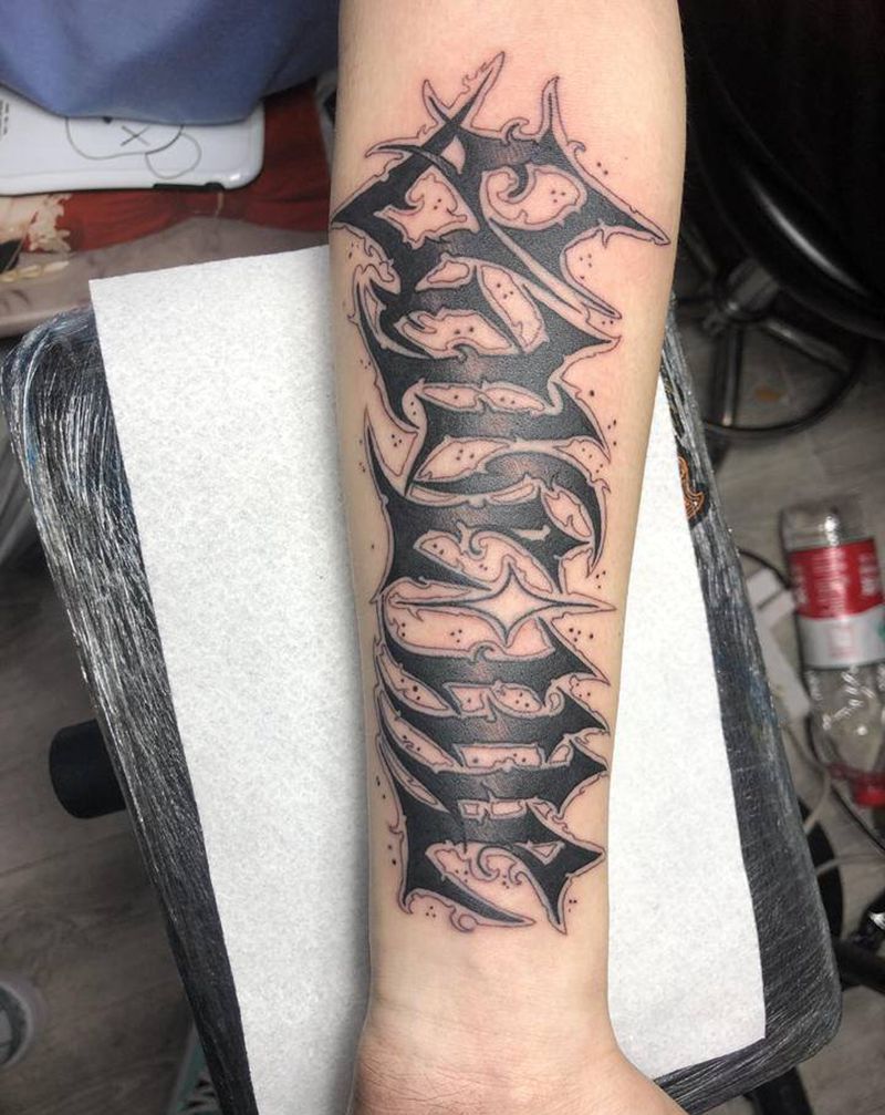 花体字，手臂纹身图片_花体字纹身图案