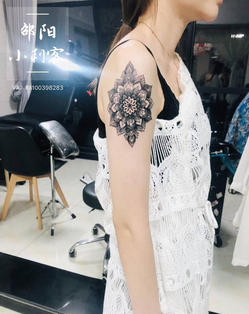 几何花纹身图片_手臂几何点刺纹身图案