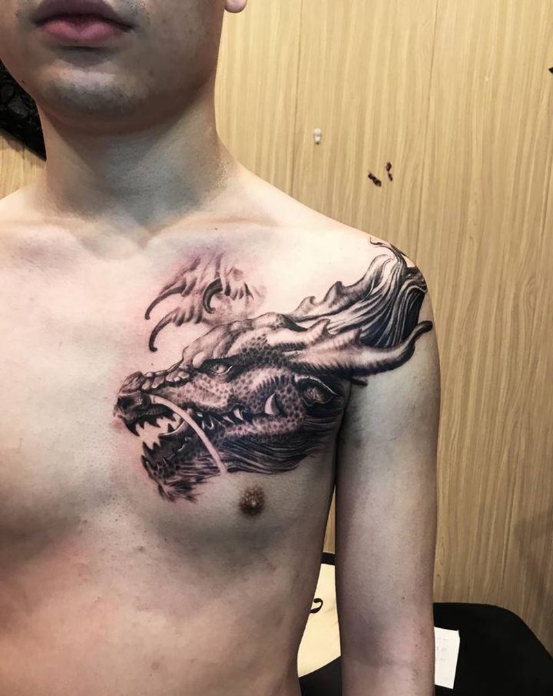 龙纹身图片_胸部新传统欧美写实纹身图案