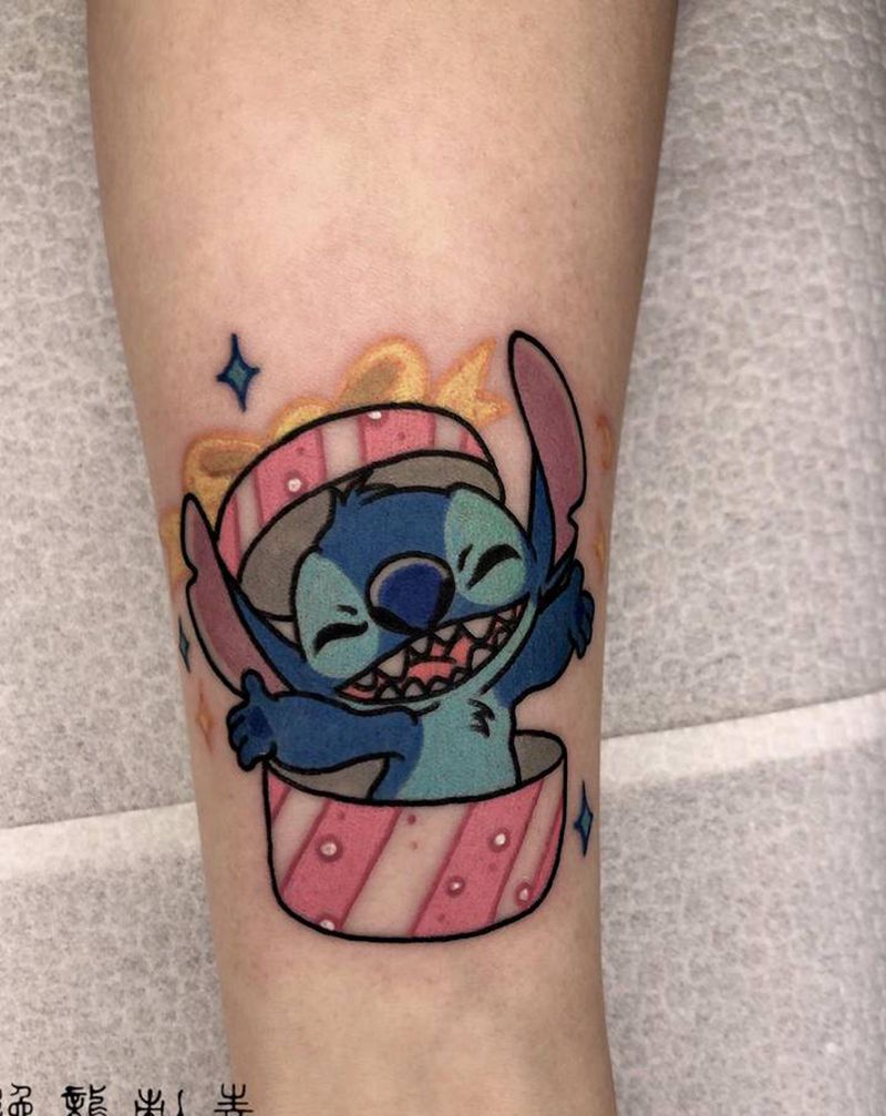 史迪仔纹身图片_手臂卡通史迪仔动漫纹身图案