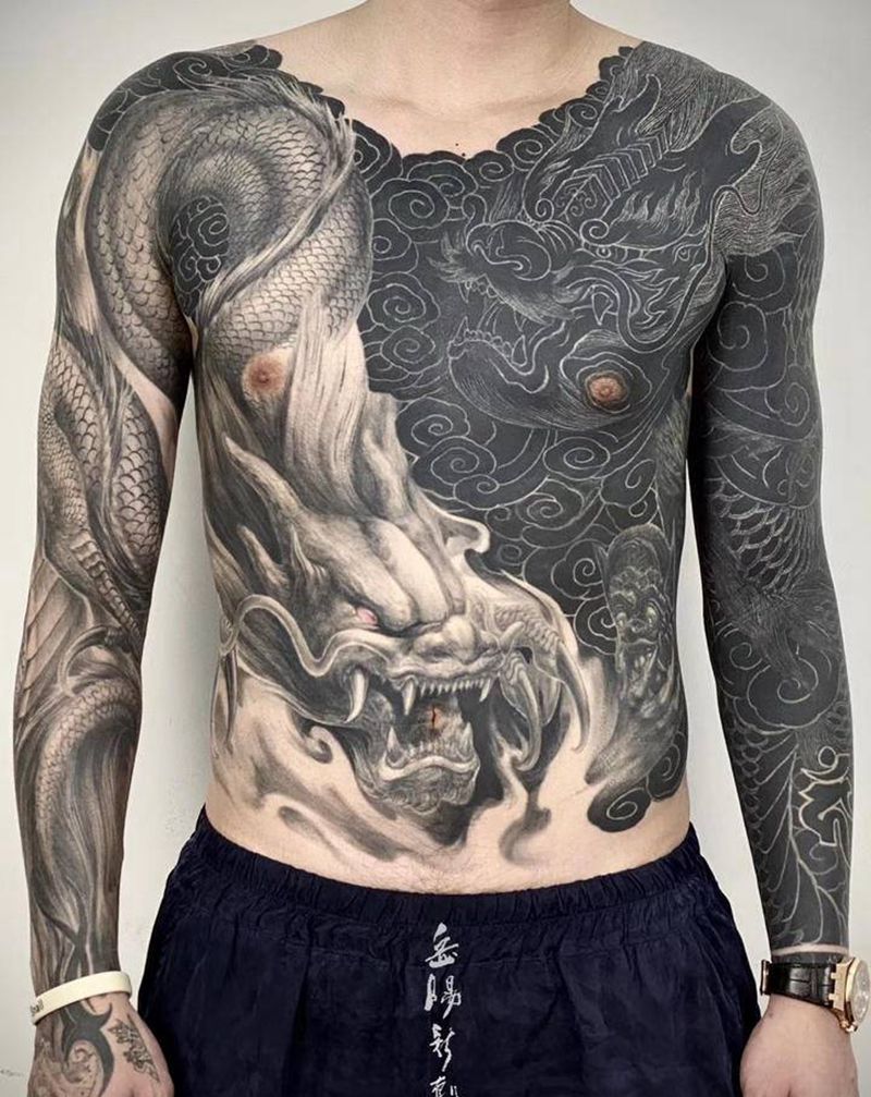 阴阳纹身图片_手臂胸部新传统龙黑臂纹身图案