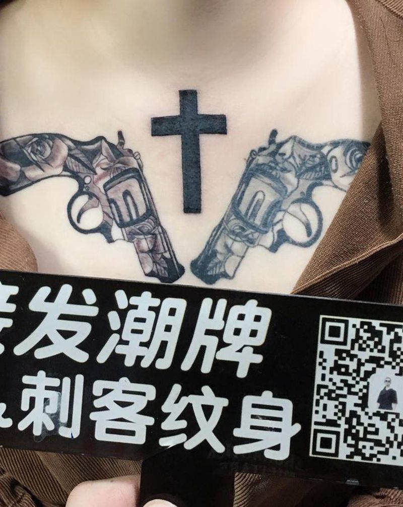 枪纹身图片_胸部手臂纹身图案