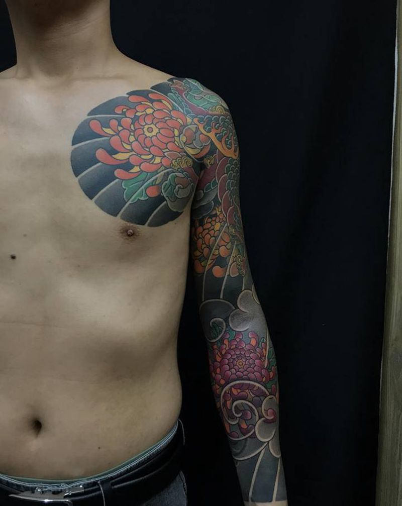 麒麟菊花纹身图片_手臂老传统纹身图案