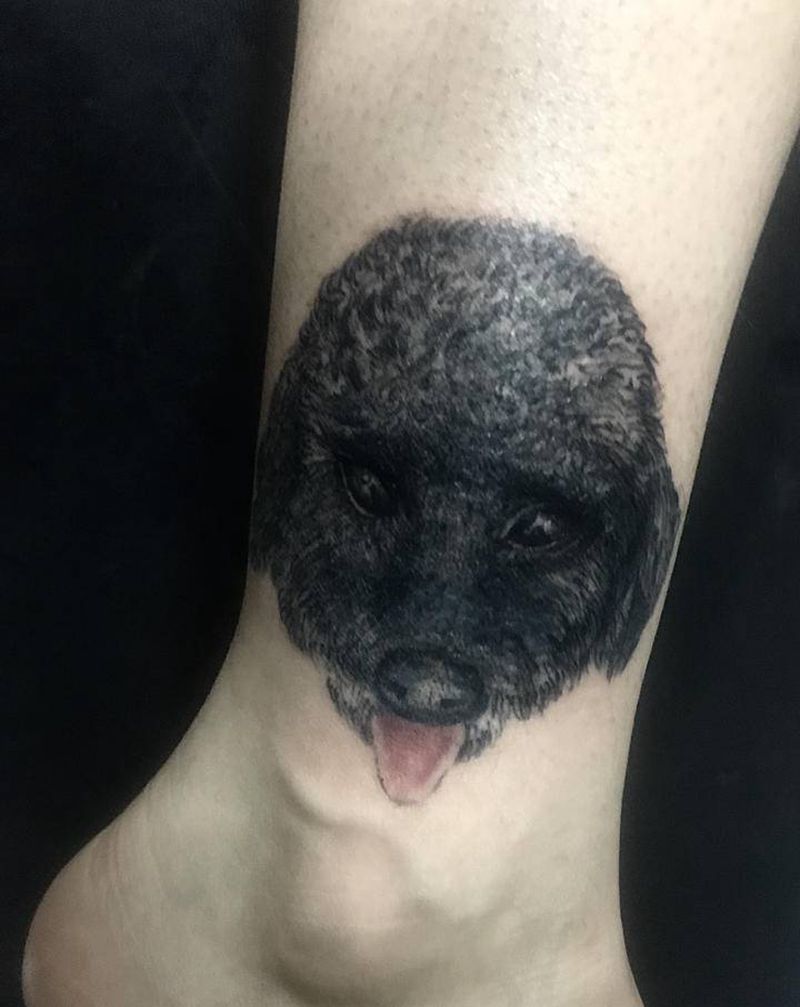 宠物狗写实未完纹身图片_脚部手部欧美写实水彩狗泰迪肖像纹身图案