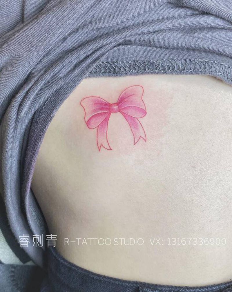 蝴蝶结遮盖疤痕纹身图片_腰部水彩纹身图案