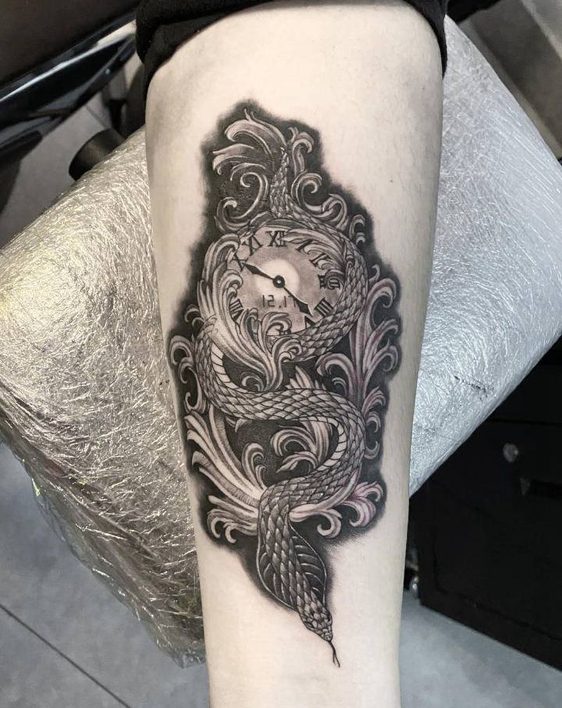 蛇遮盖纹身图片_手臂欧美写实纹身图案