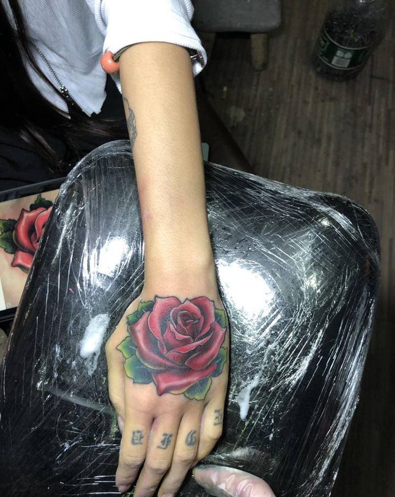 手背。玫瑰！遮盖纹身图片_手部手背。遮盖纹身图案