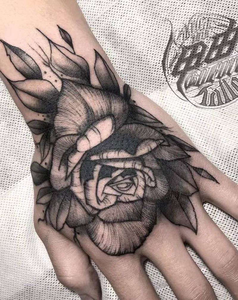 花卉手背纹身图片_手部点刺纹身图案