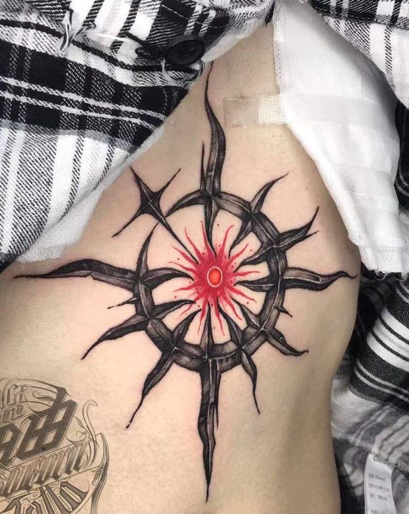 太阳轮纹身图片_腹部点刺纹身图案