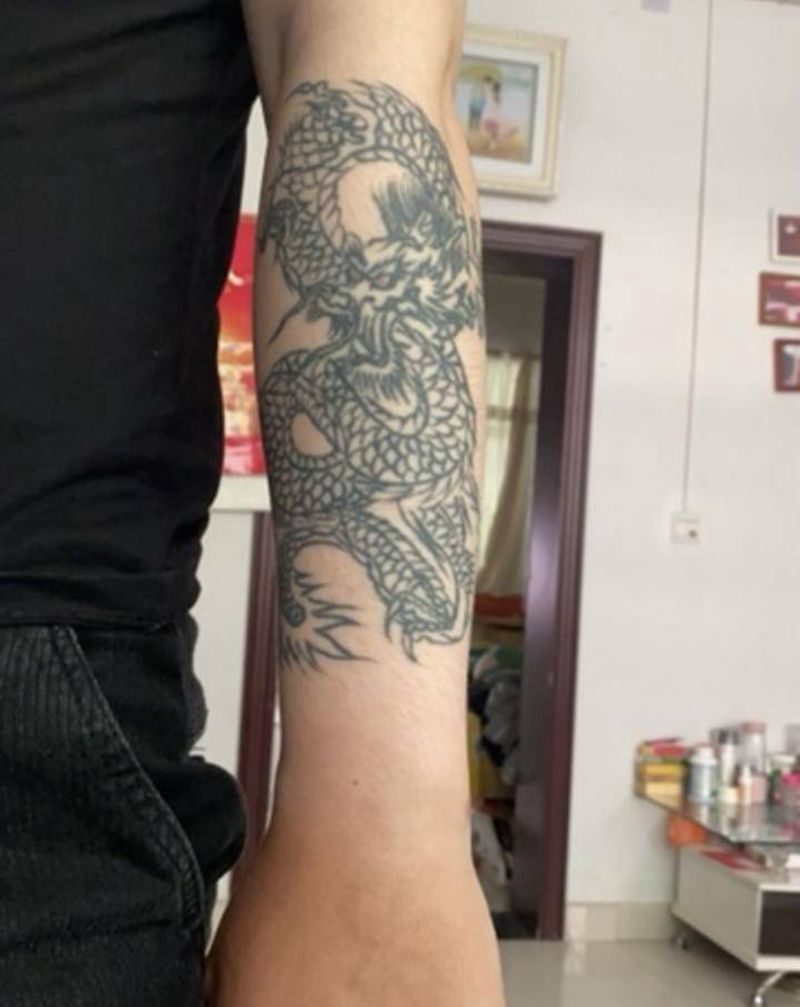 遮盖武士纹身图片_手臂老传统纹身图案