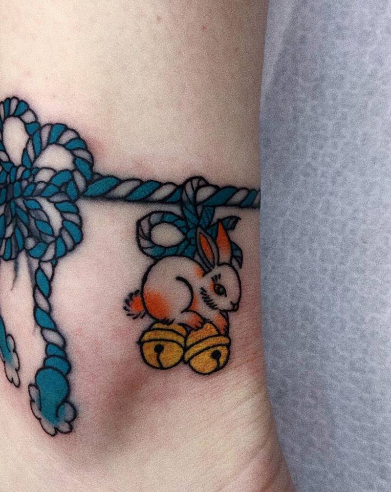 日式脚环纹身图片_手臂老传统鱼达摩兔子纹身图案