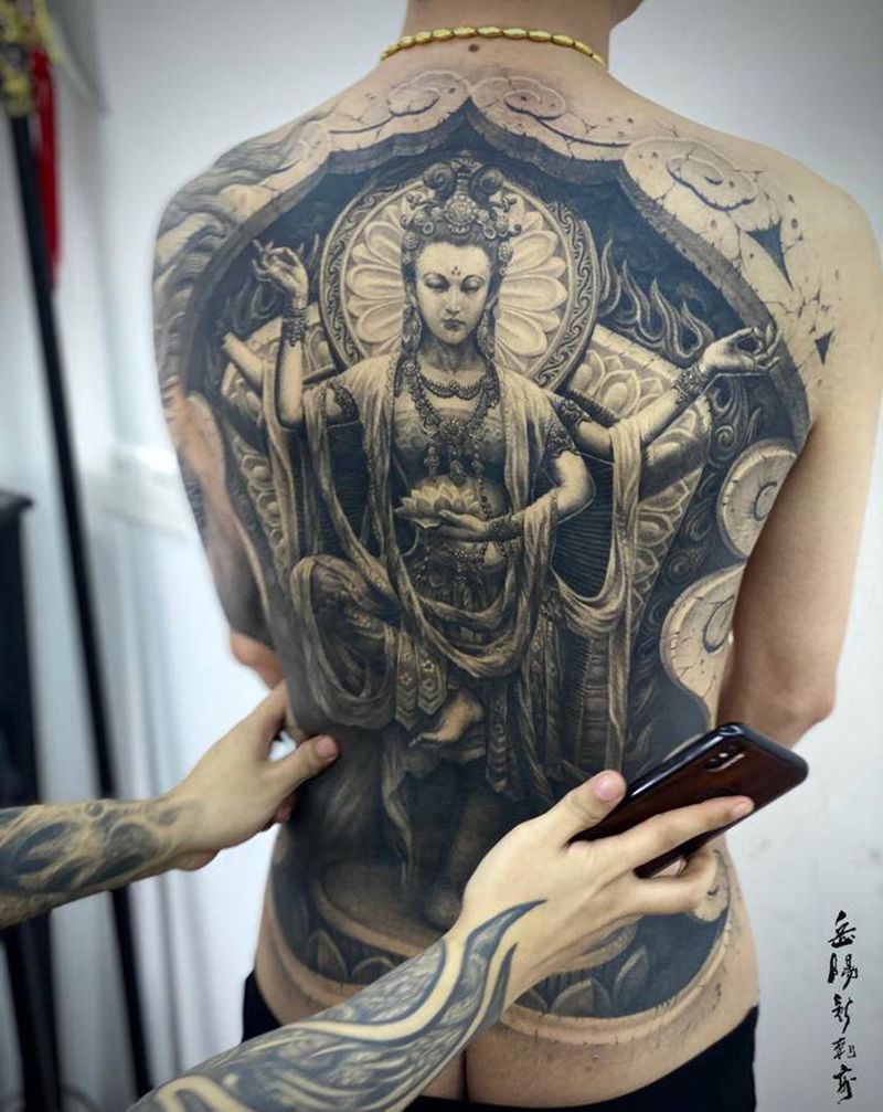 .纹身图片_背部手臂新传统欧美写实敦煌石雕纹身图案