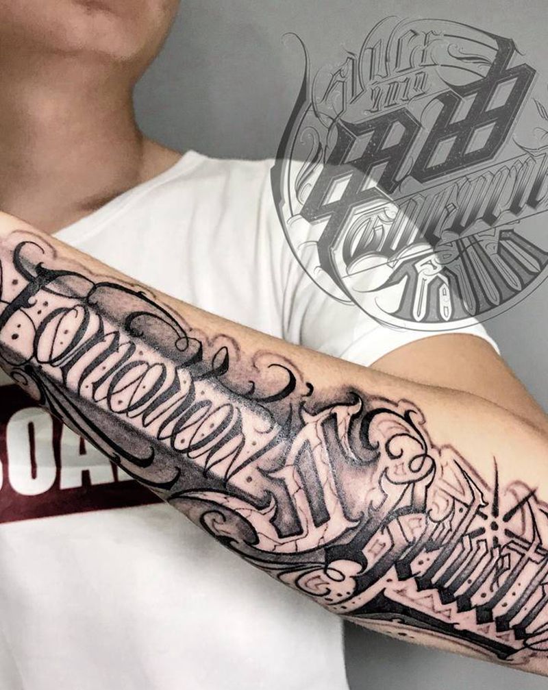 重生于明日纹身图片_手臂花体字纹身图案