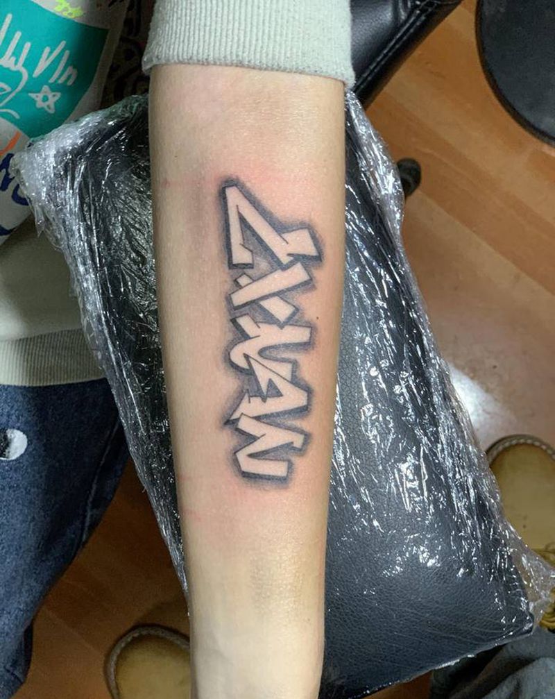涂鸦英文纹身图片_手臂纹身图案