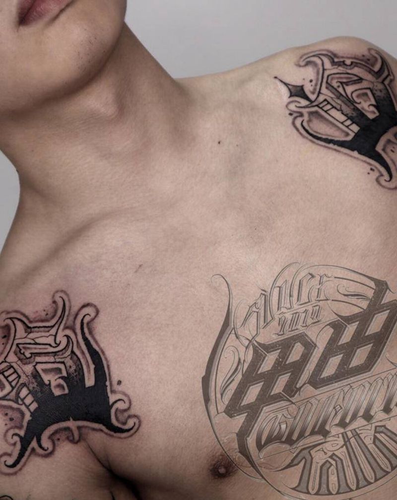 CD纹身图片_肩部花体字纹身图案