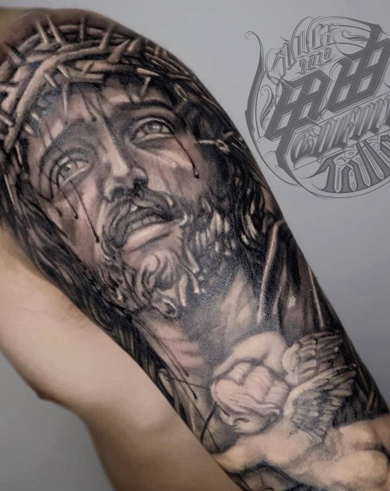 写实耶稣纹身图片_手臂欧美写实纹身图案