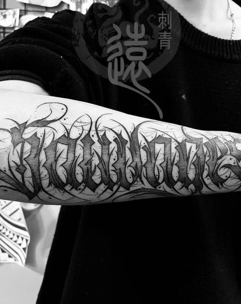 花体字纹身图片_手臂纹身图案