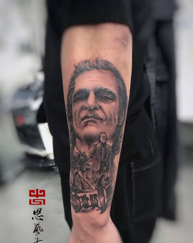 小丑纹身图片_手臂手部欧美写实纹身图案