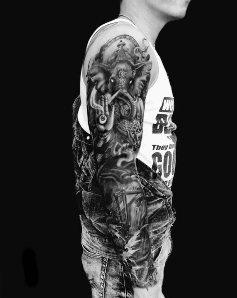 遮盖纹身图片_手臂欧美写实纹身图案