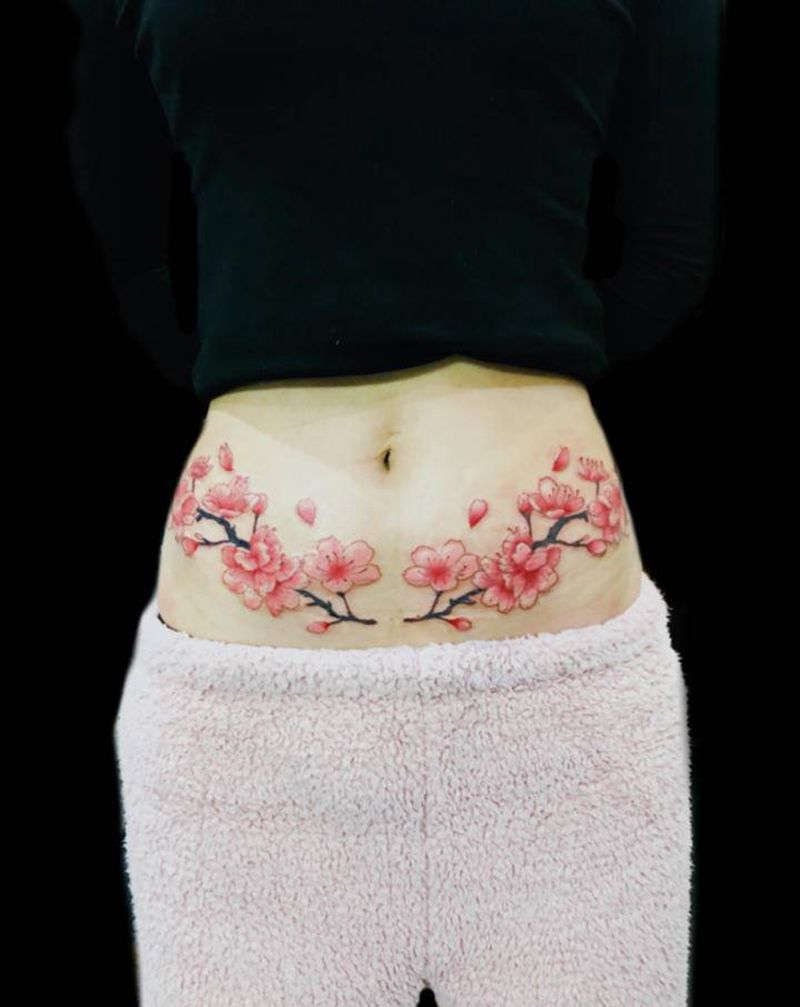 遮盖纹身图片_腹部水彩纹身图案