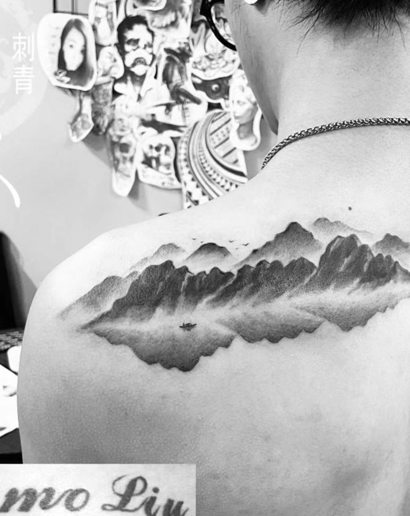 山水遮盖纹身图片_手臂水墨纹身图案