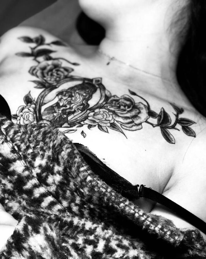 湘西瞳画纹身图片_胸部纹身图案