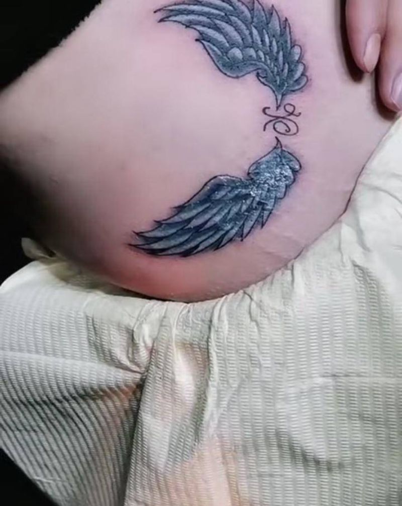 腹部翅膀完成纹身图片_腹部新传统纹身图案