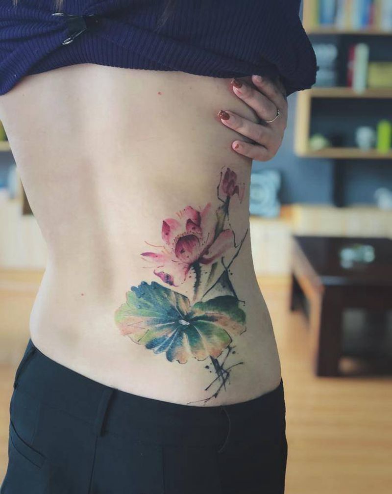 湘西瞳画刺青纹身图片_腰部水墨水彩纹身图案