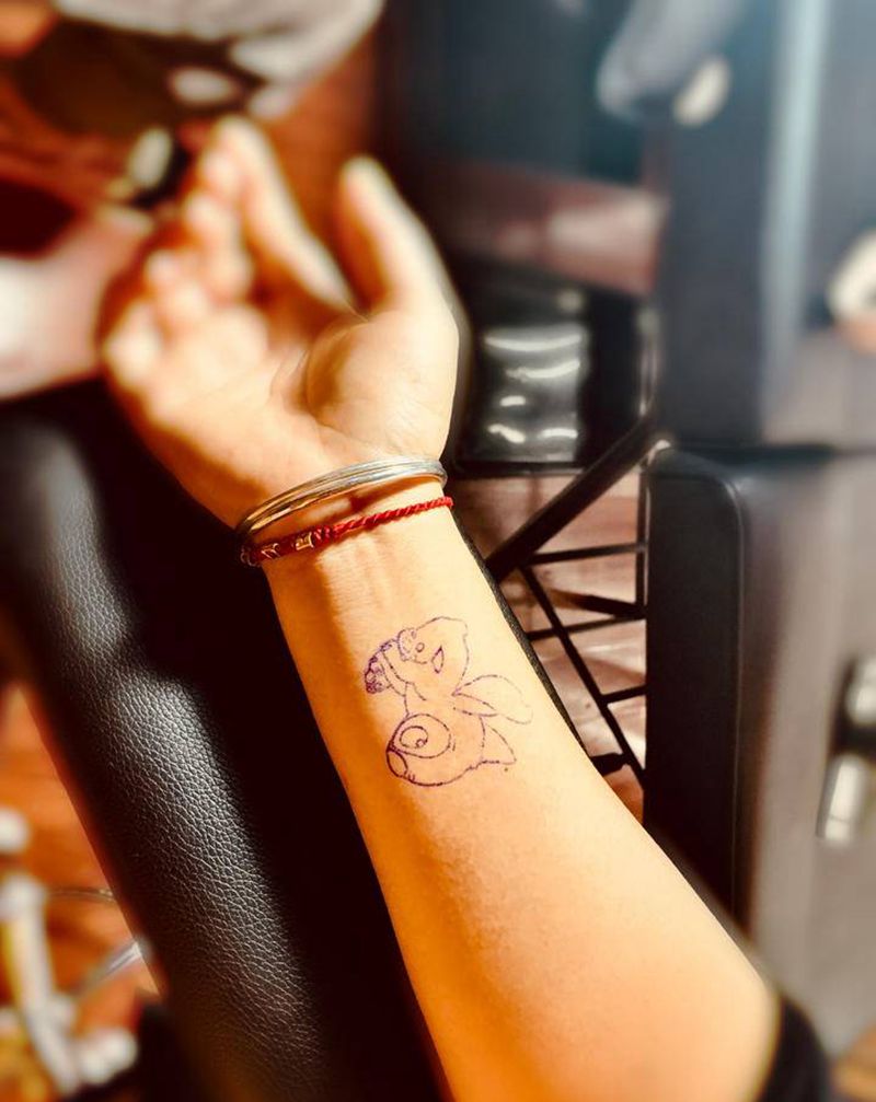 史迪仔纹身图片_手部纹身图案