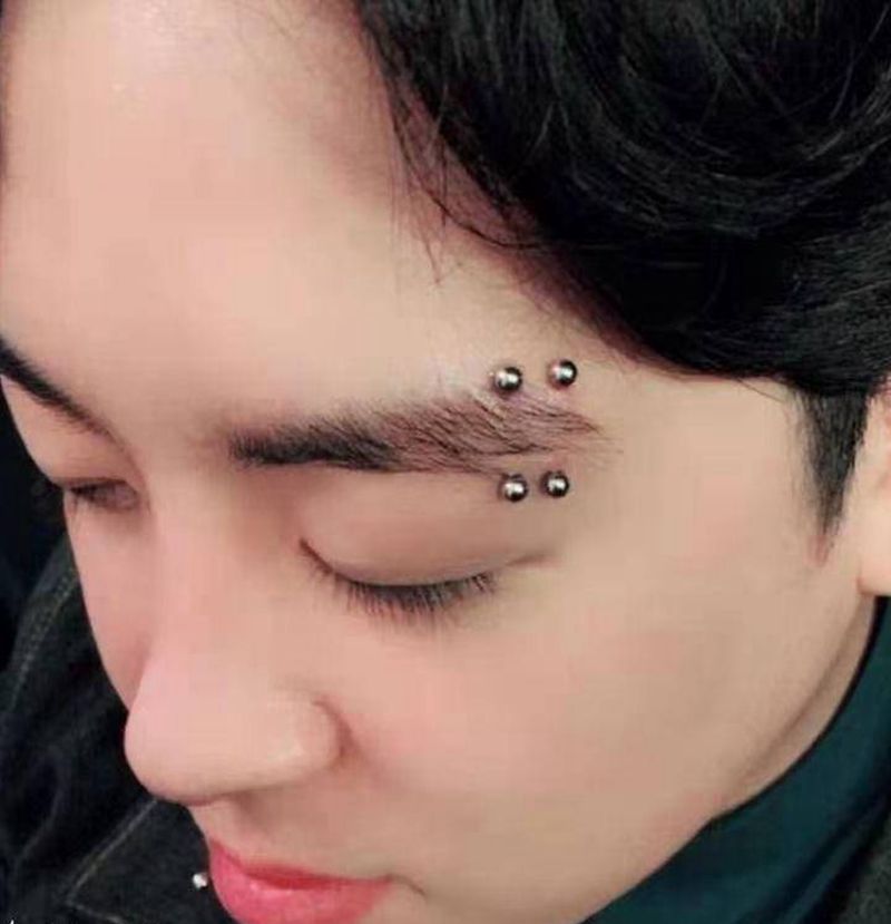 眉钉，耳钉，脐钉纹身图片_腰部新传统纹身图案