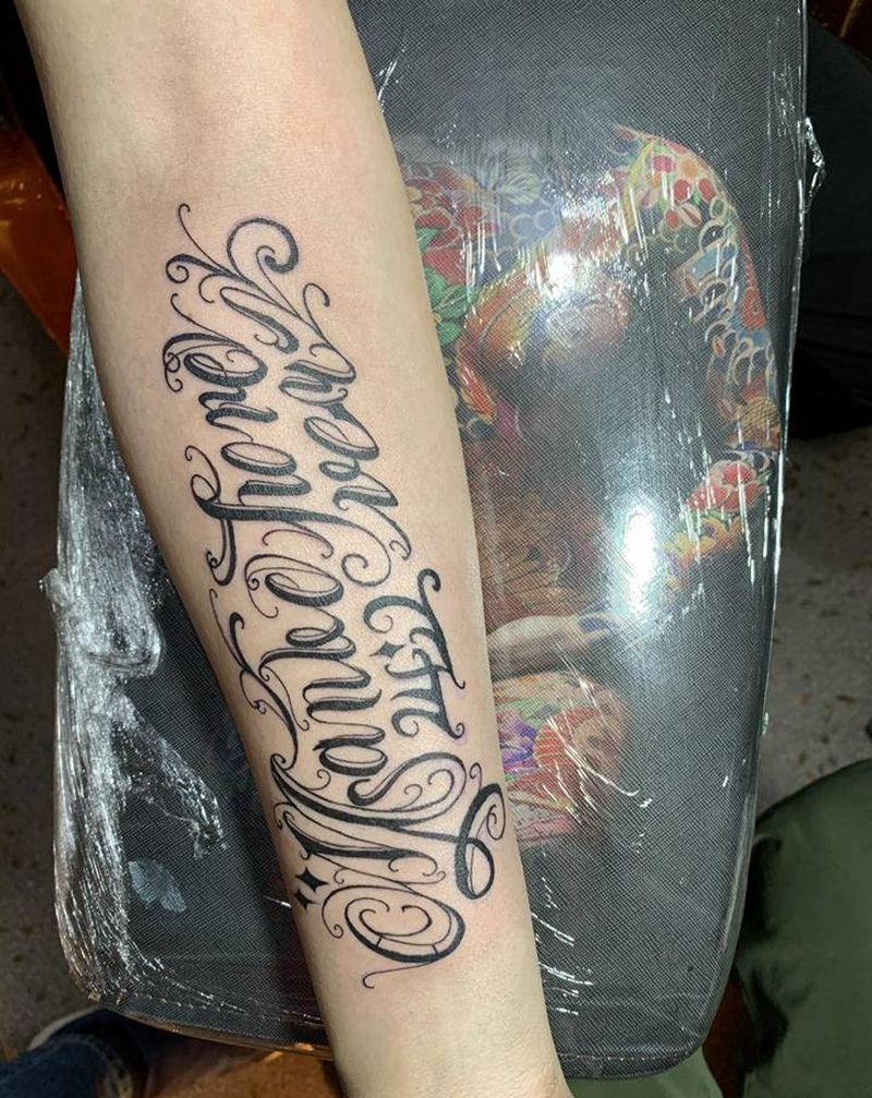 花体纹身图片_手臂花体字纹身图案
