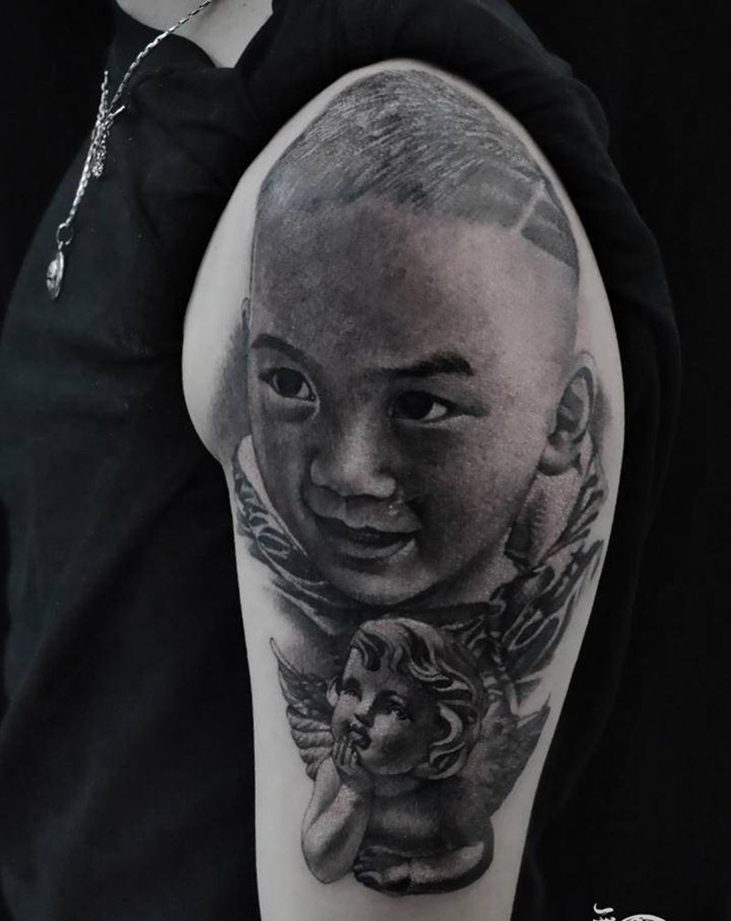 肖像纹身图片_手臂欧美写实纹身图案