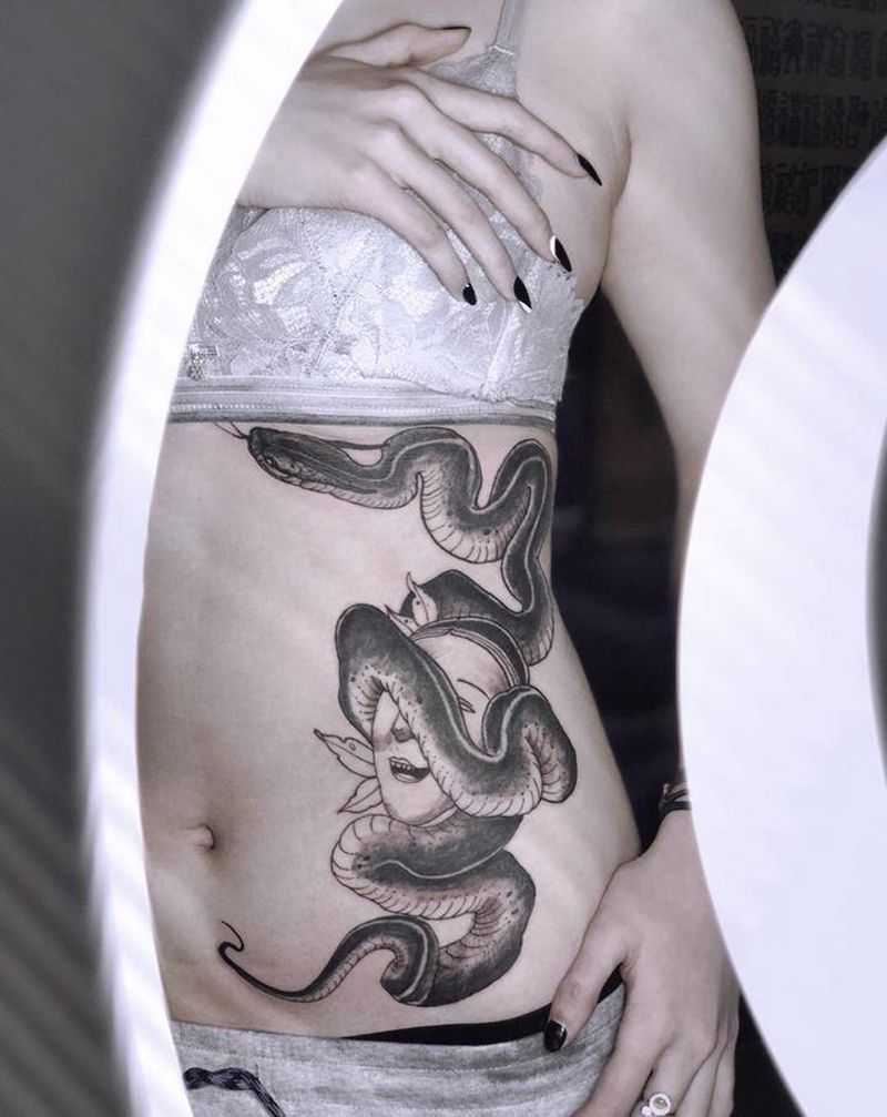 吉首纹身湘西瞳画刺青纹身图片_腰部纹身图案